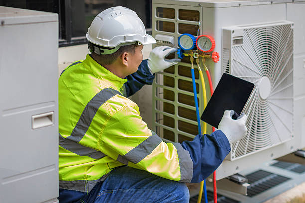 Professional Emergency Ac Repair technician working in Edgewood, PA